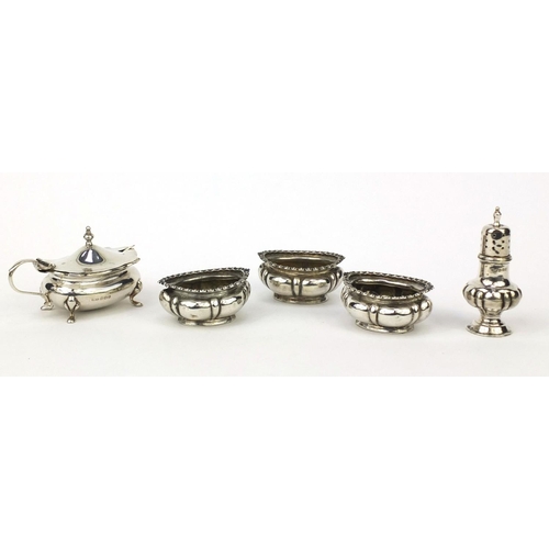 873 - Five silver cruet items comprising three open salts, mustard with hinged lid and miniature castor, v... 