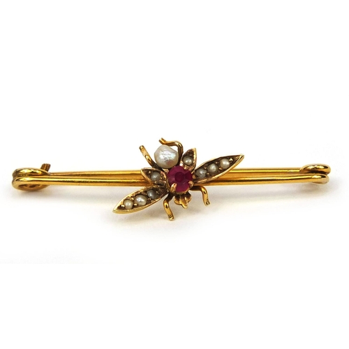 1007 - 9ct gold fly bar brooch set with seed pearls and a ruby, 3.5cm long, approximate weight 1.2g