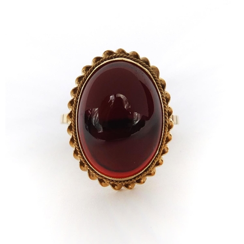 1012 - 9ct gold cabochon garnet ring, size N, approximate weight 5.1g