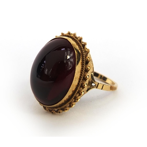 1012 - 9ct gold cabochon garnet ring, size N, approximate weight 5.1g