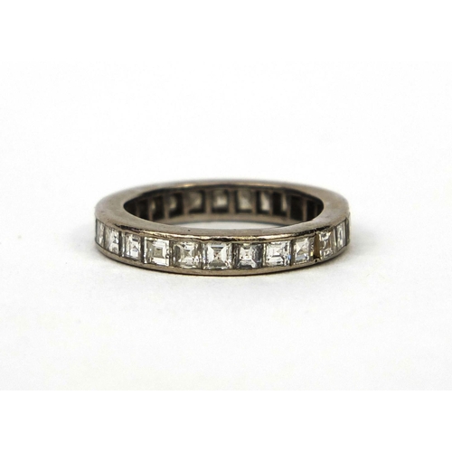 934 - Unmarked white metal diamond eternity ring, set with approximately twenty seven diamonds, size J, ap... 