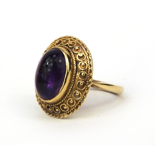 948 - Large 9ct gold cabochon amethyst ring, size O, approximate weight 7.0g