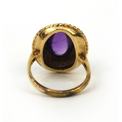 948 - Large 9ct gold cabochon amethyst ring, size O, approximate weight 7.0g