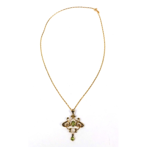 950 - Art Nouveau 9ct gold Peridot and seed pearl pendant on a 9ct gold necklace, the pendant 4.5cm long, ... 