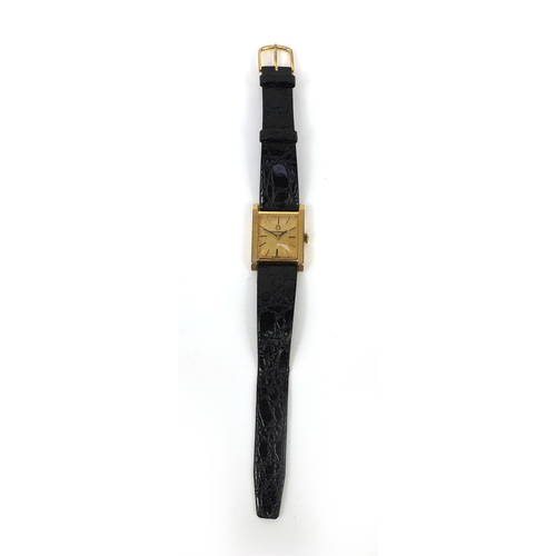 1048 - 18ct gold ladies Bucherer wristwatch with black leather strap