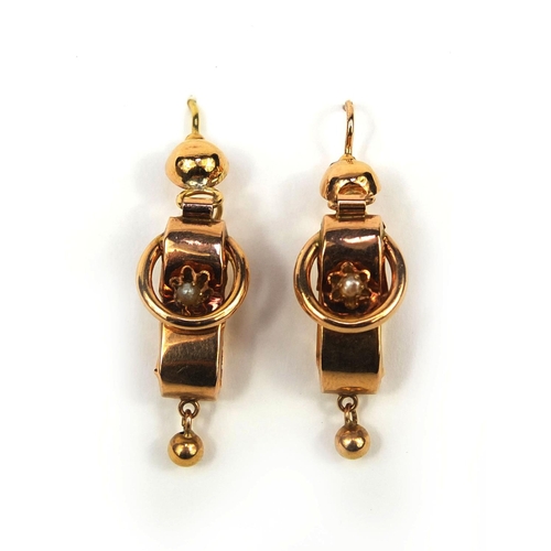 1015 - Pair of French gold designer drop earrings, each set with a seed pearl, each with impressed eagle he... 