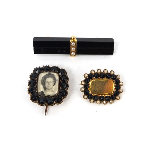 1000 - Victorian Jet and unmarked gold bar brooch set with seed pearls and two mourning brooches, including... 