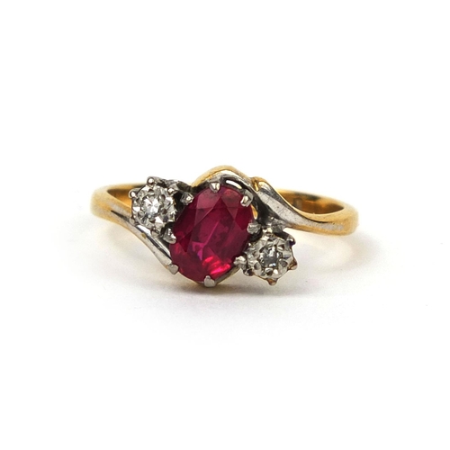 998 - 18ct gold ruby and diamond crossover ring set with a central ruby and two diamonds, size K, approxim... 