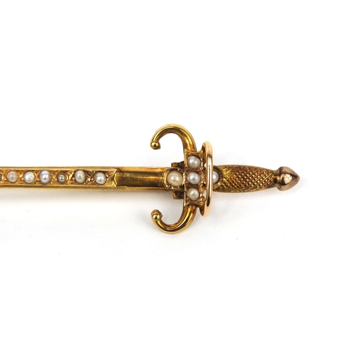 965 - 9ct gold sword bar brooch set with sixteen seed pearls, 6cm long, approximate weight 2.2g