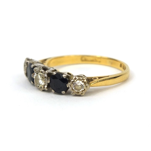 979 - 18ct gold diamond and sapphire ring set with three solitaire diamonds and two solitaire sapphires, s... 