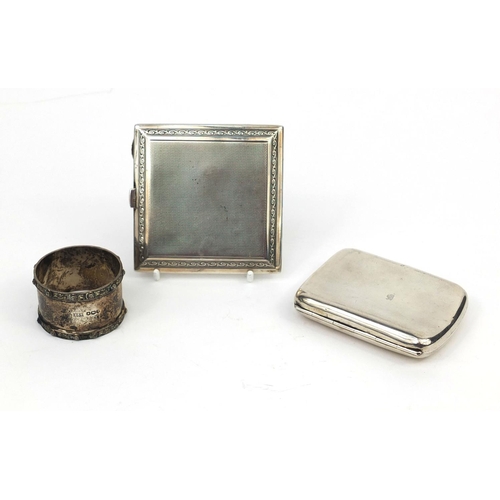 828 - Two silver cigarette cases one with engine turned decoration and a circular silver napkin ring, vari... 