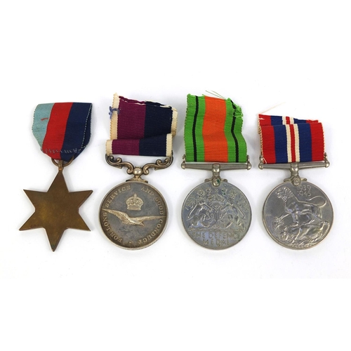 351 - British Military interest World War II medal group including a Long service and good conduct medal, ... 