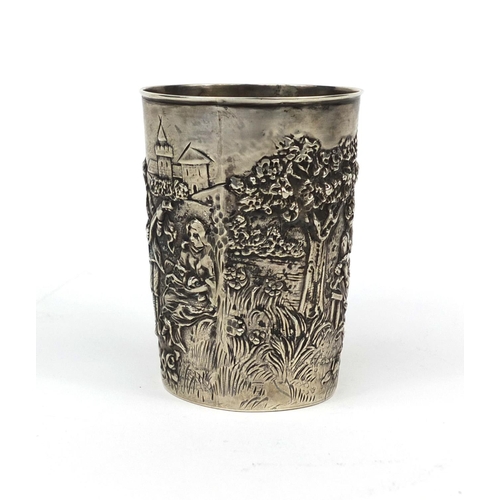 870 - 800 grade silver beaker embossed with scenes of lovers, impressed 800 to the base, 7.5cm high, appro... 