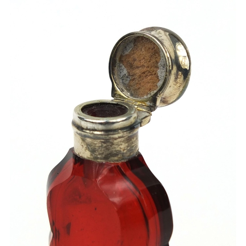 82 - Victorian silver topped ruby glass scent bottle, 10.2cm in length