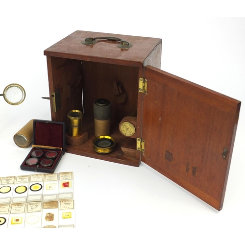 57 - Stanley of London adjustable brass microscope with fitted mahogany carrying box, together with vario... 