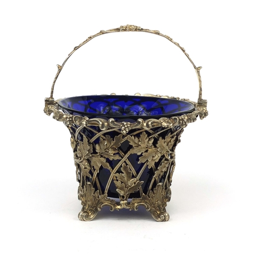 809 - Early Victorian swing handle sugar basket with wire lattice body, cast with acorns, oak leaves and f... 