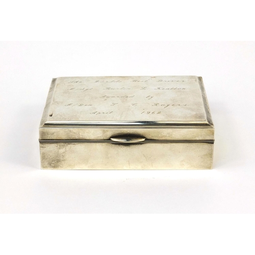 377 - Rectangular silver cigarette box, the hinged lid engraved The Worlds Best Driver M/SGT. Burlin L.Kea... 