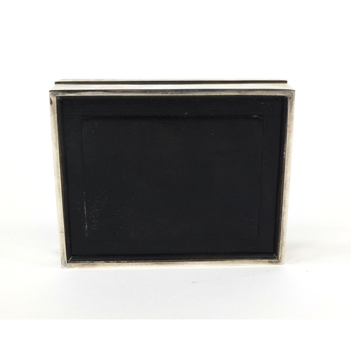 377 - Rectangular silver cigarette box, the hinged lid engraved The Worlds Best Driver M/SGT. Burlin L.Kea... 