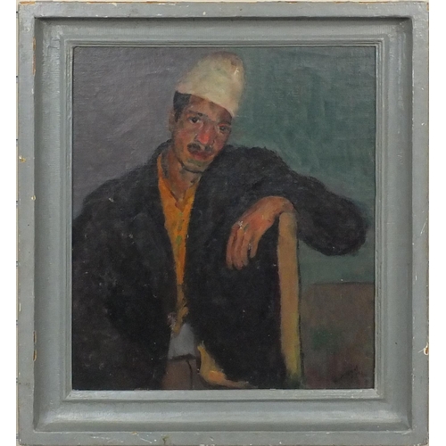 2194 - North African school oil onto board, seated man wearing a Fez, bearing a signature L a Hunt, inscrib... 