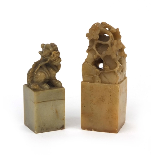 520 - Two Chinese hard stone seals, one carved with a dragon the other with flowers, one with script to th... 