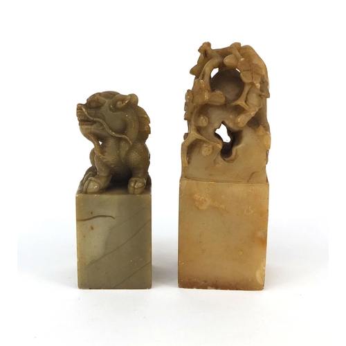 520 - Two Chinese hard stone seals, one carved with a dragon the other with flowers, one with script to th... 