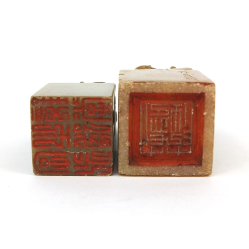 520 - Two Chinese hard stone seals, one carved with a dragon the other with flowers, one with script to th... 