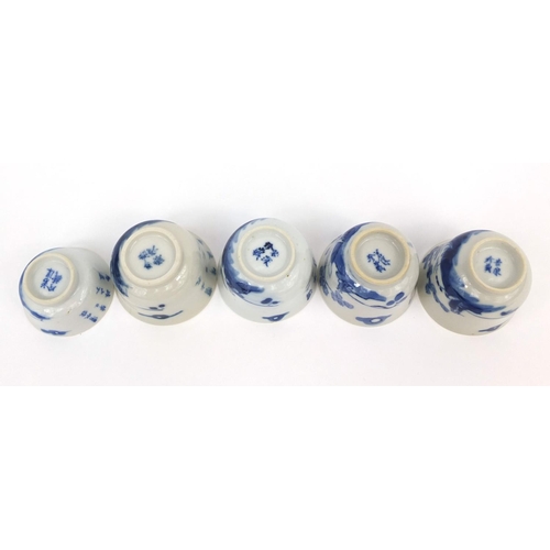449 - Five Chinese blue and white porcelain tea bowls, each hand painted with figures and trees, some with... 