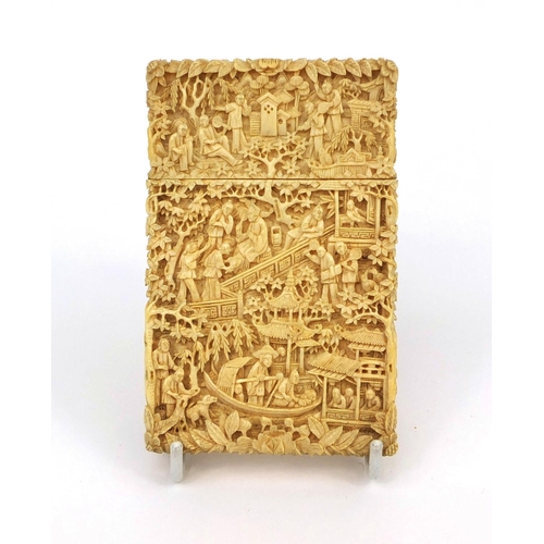 528 - Good rectangular Chinese Canton ivory card case, profusely carved with figures, pagodas and junks, c... 