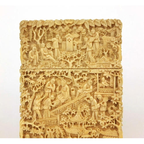 528 - Good rectangular Chinese Canton ivory card case, profusely carved with figures, pagodas and junks, c... 