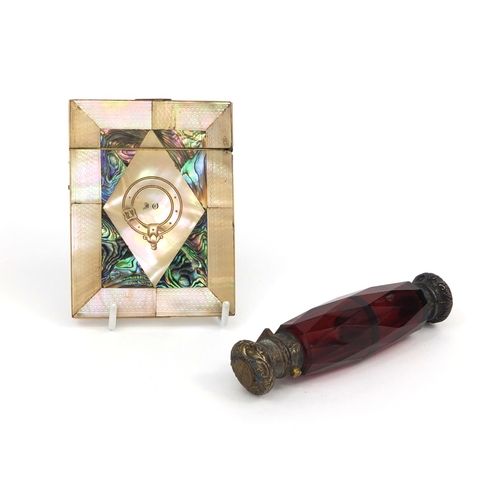 83 - Victorian ruby glass double ended scent/vinaigrette bottle together with a Mother of Pearl and abalo... 