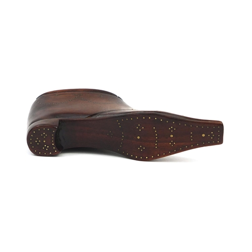 138 - 19th century treen snuff box in the form of a shoe, with brass studded decoration and forget me not ... 