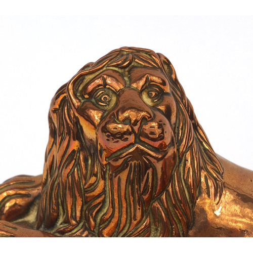 48 - Victorian copper jelly mould in the form of a recumbent lion, stamped R.V.2 to the rim, 17cm high