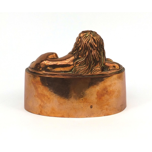 48 - Victorian copper jelly mould in the form of a recumbent lion, stamped R.V.2 to the rim, 17cm high