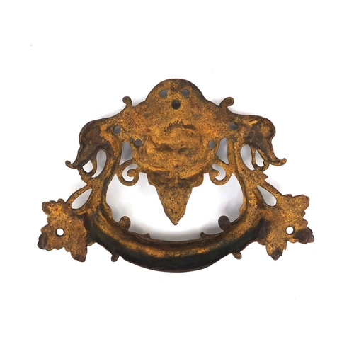 54 - Victorian bronze door handle with swan handle and grotesque face, 17.5cm wide