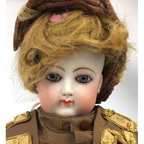 398 - Francois Gaultier bisque headed doll, wearing a traditional dress, impressed 7 to the back of the he... 