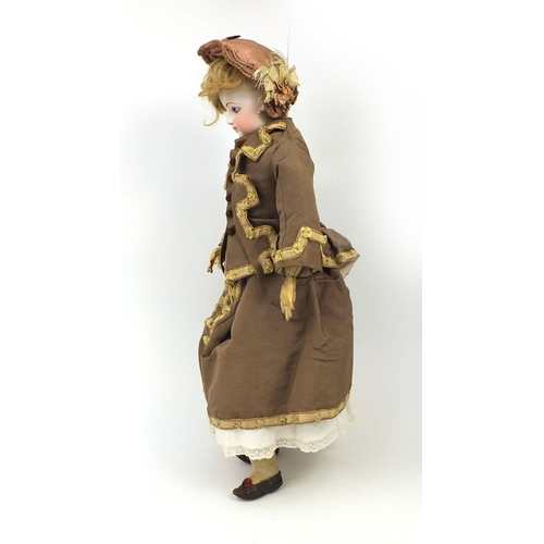 398 - Francois Gaultier bisque headed doll, wearing a traditional dress, impressed 7 to the back of the he... 