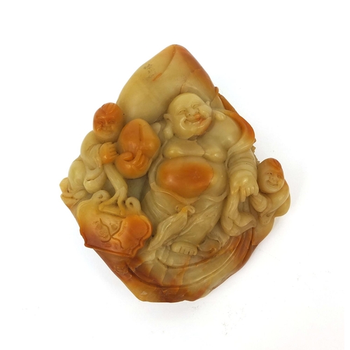 518 - Chinese hard stone carving of three figures, holding lucky fruit, 12.5cm  x 10cm