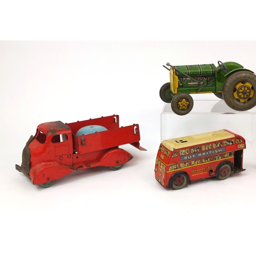 418 - Tin plate vehicles including a London Transport Bus and a Mettoy tractor, the largest 25cm in length
