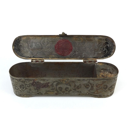 638 - Turkish dome topped iron pen box with inset inkwell, engraved with script and a floral motifs, 10cm ... 