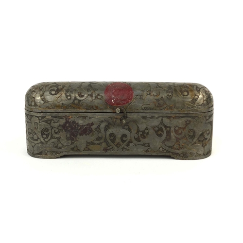 638 - Turkish dome topped iron pen box with inset inkwell, engraved with script and a floral motifs, 10cm ... 