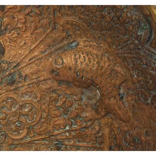 632 - Islamic bronze dish cast with a crab, three fish and floral motifs, 30cm in diameter