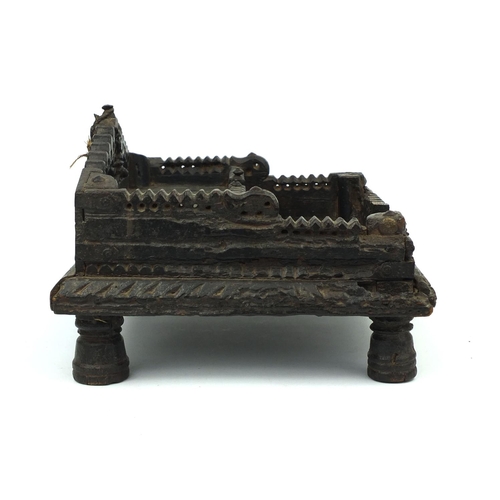 646 - Antique Middle Eastern carved wooden two tier font with iron strap work, pierced decoration and two ... 