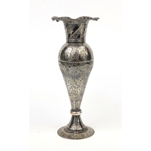 598 - Indian unmarked silver vase with frilled rim, engraved with panels of figures some on horseback amon... 