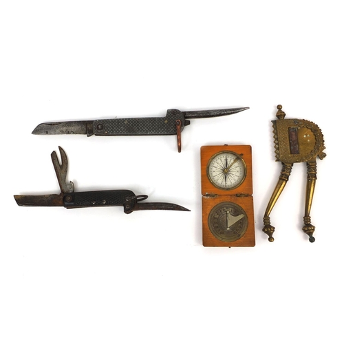 155 - Objects including two steel bladed folding knives and a pocket sun dial compass, the largest 17cm in... 