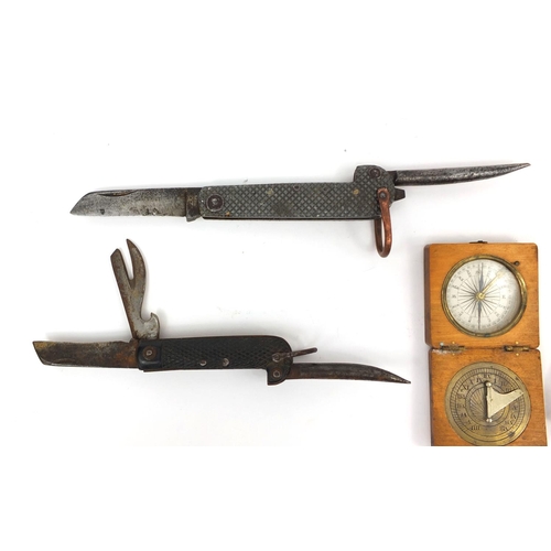 155 - Objects including two steel bladed folding knives and a pocket sun dial compass, the largest 17cm in... 