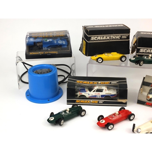 417 - Group of vintage model racing vehicles, some boxed Scalextric including C.125 Porsche Turbo 935, C12... 