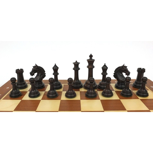 404 - Well carved half rosewood half boxwood chess set and chess board, the largest chess piece 9cm high, ... 