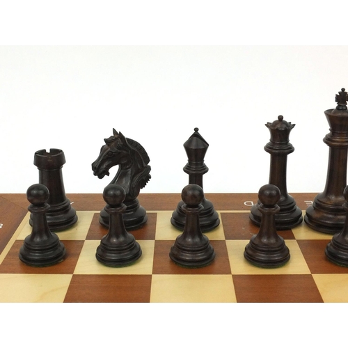 404 - Well carved half rosewood half boxwood chess set and chess board, the largest chess piece 9cm high, ... 