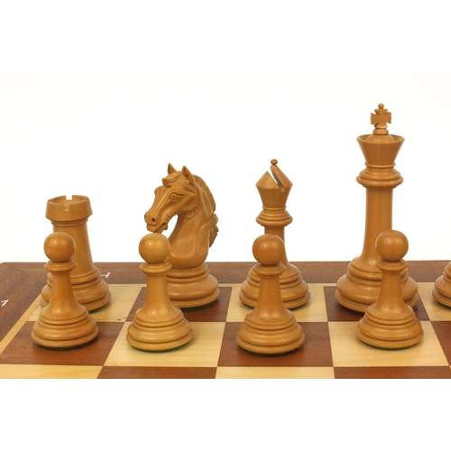 404 - Well carved half rosewood half boxwood chess set and chess board, the largest chess piece 9cm high, ... 