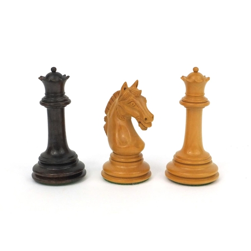 404 - Well carved half rosewood half boxwood chess set and chess board, the largest chess piece 9cm high, ... 